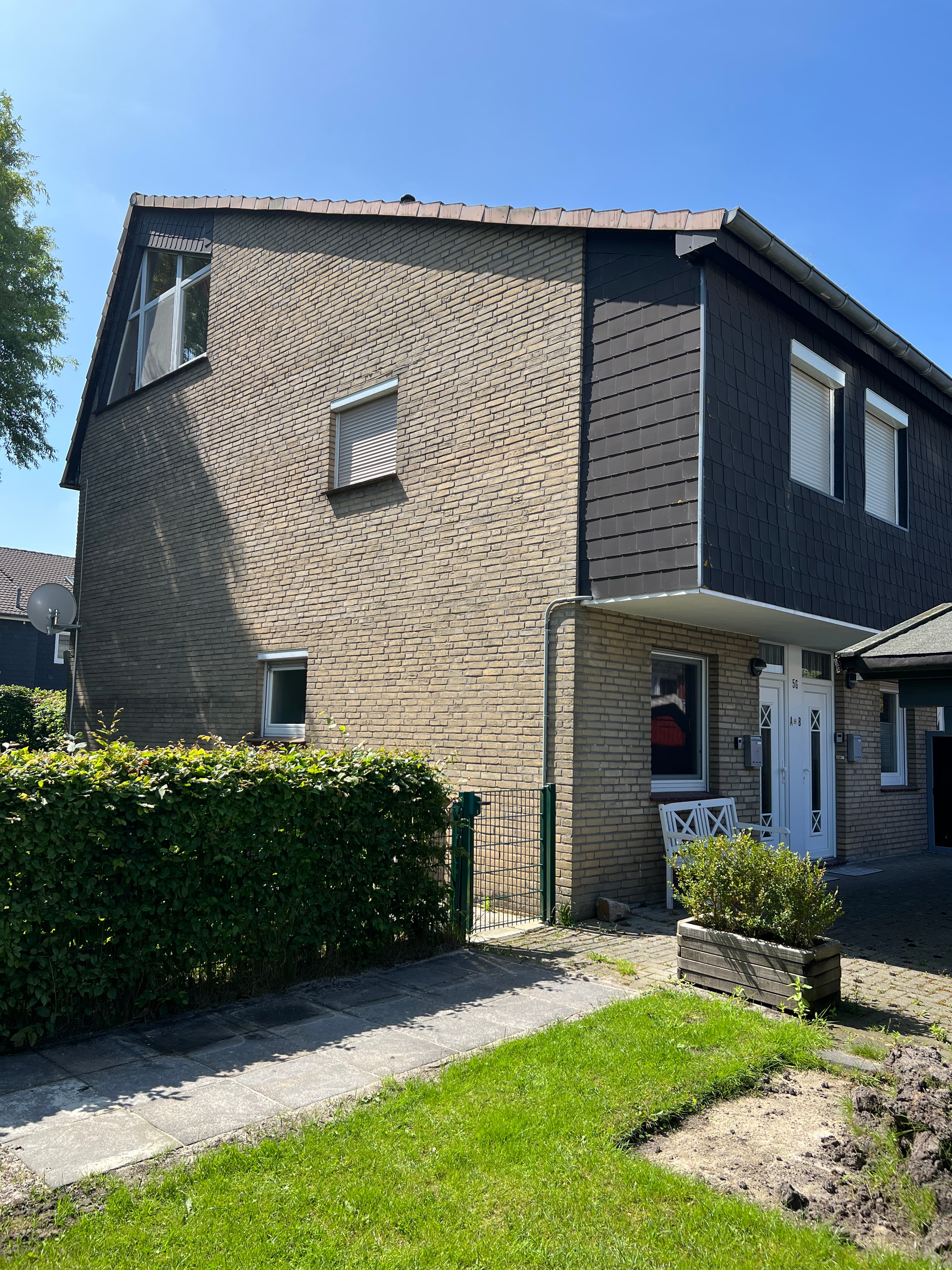 Ferienwohnung Hooksiel - Tolle EG-Wohnung, hell und gemütlich mit komplett eingezäuntem Süd-Garten!