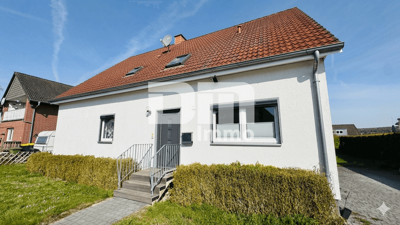 Charmantes Ein- bis Zweifamilienhaus mit großem Garten in begehrter Lage
