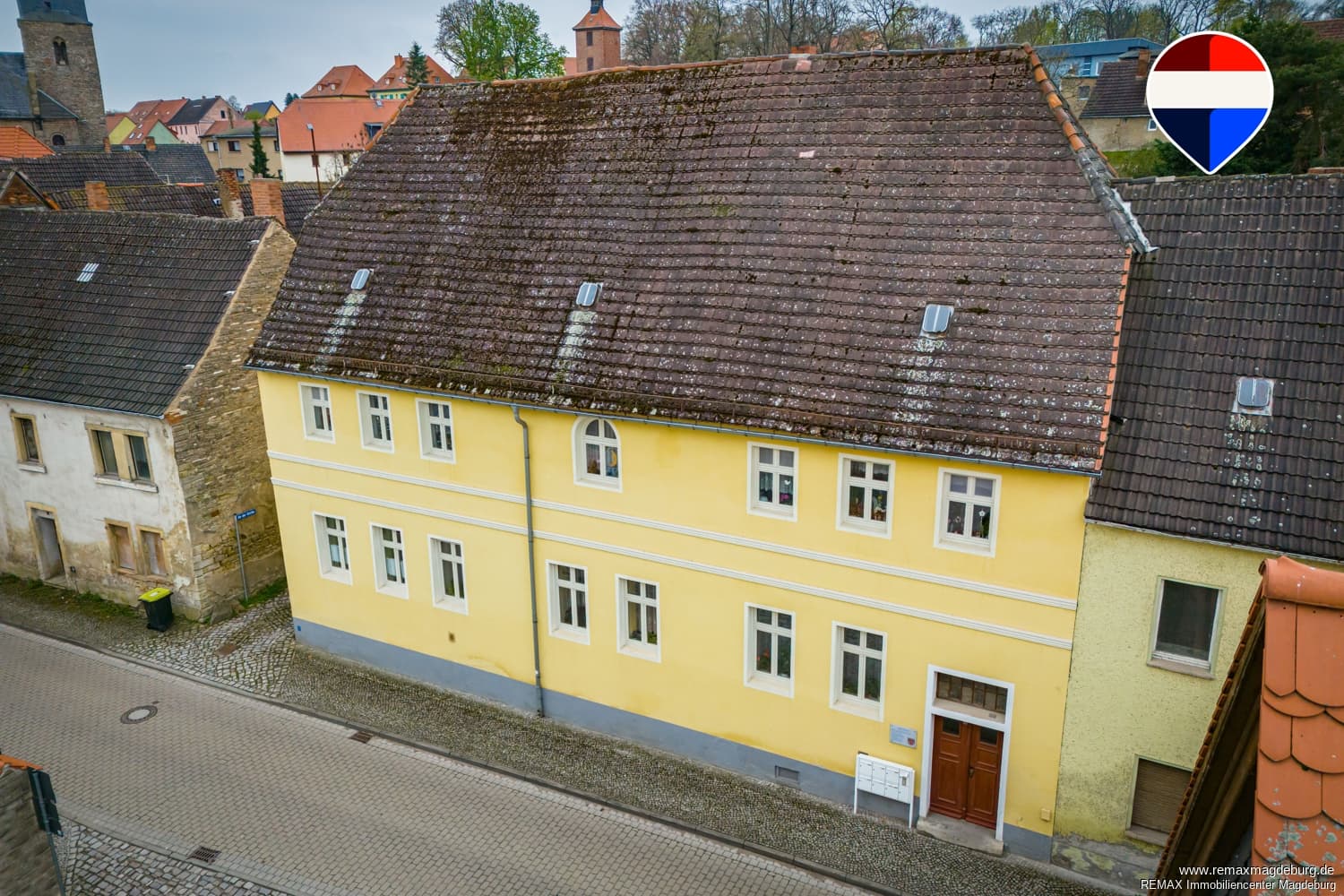 Kapitalanlage mit Ausbaupotenzial – Denkmalgeschütztes Mehrfamilienhaus auf großzügigem Grundstück