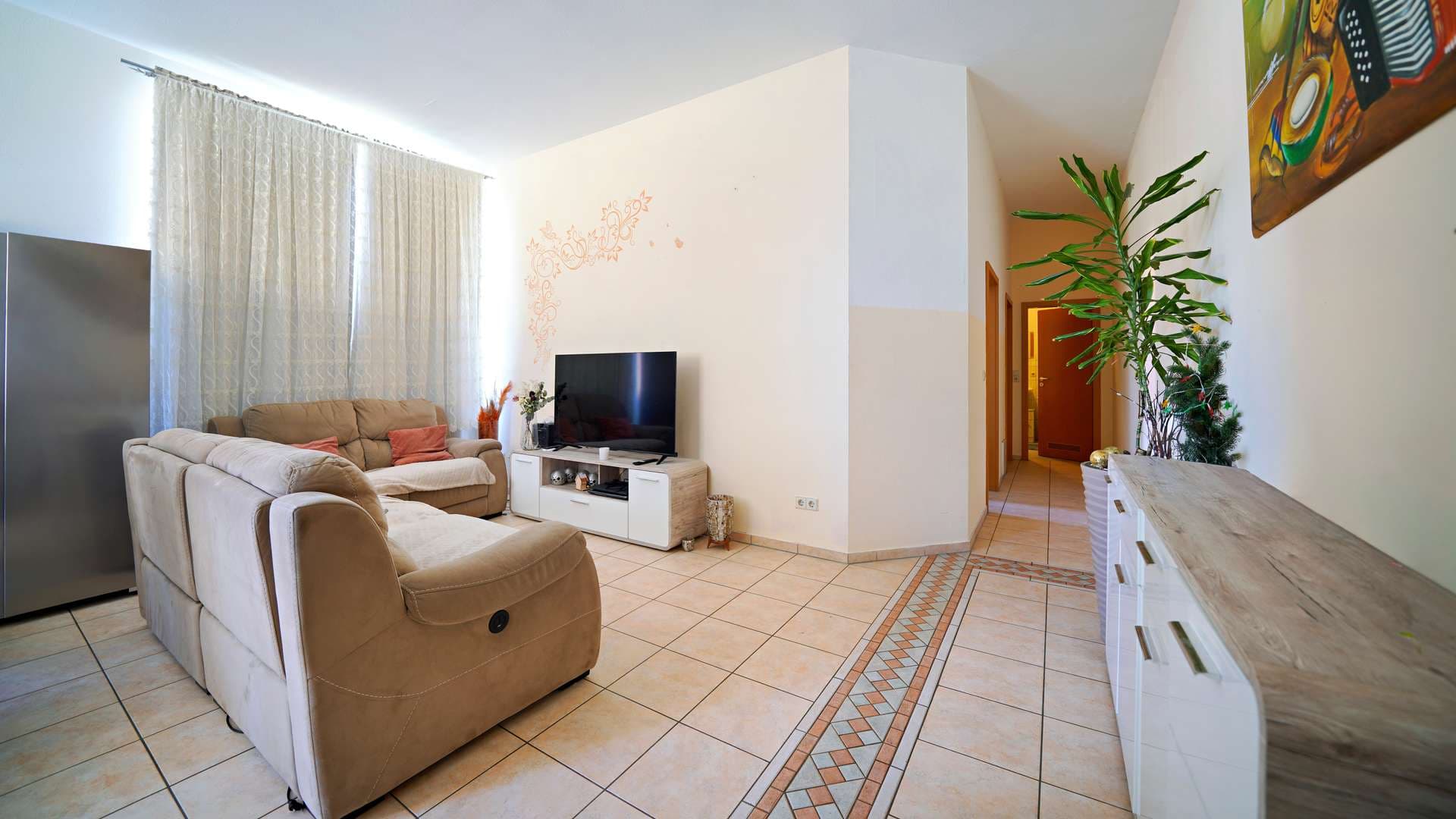 Vermietete 3-Zimmer-Wohnung mit Balkon, TG-Stellplatz & Mietsteigerungsmöglichkeit