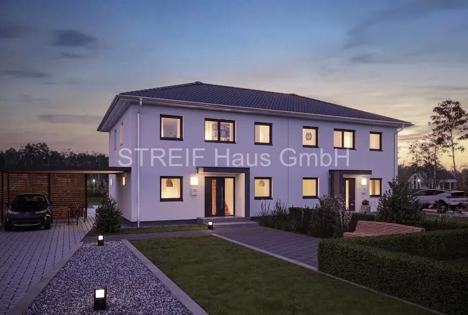 Moderne Doppelhaushälfte als Stadtvilla mit Grundstück