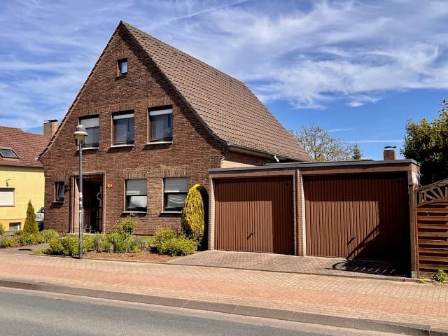 Rheinberg-Budberg: Wohnen wie im Bungalow - aber mit zusätzlicher Mieteinnahme!