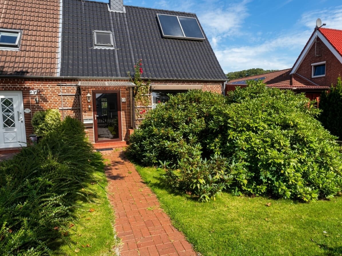 Gepflegtes Reihenendhaus mit Wintergarten, Garage und schönem Garten in ruhiger Lage von Marne
