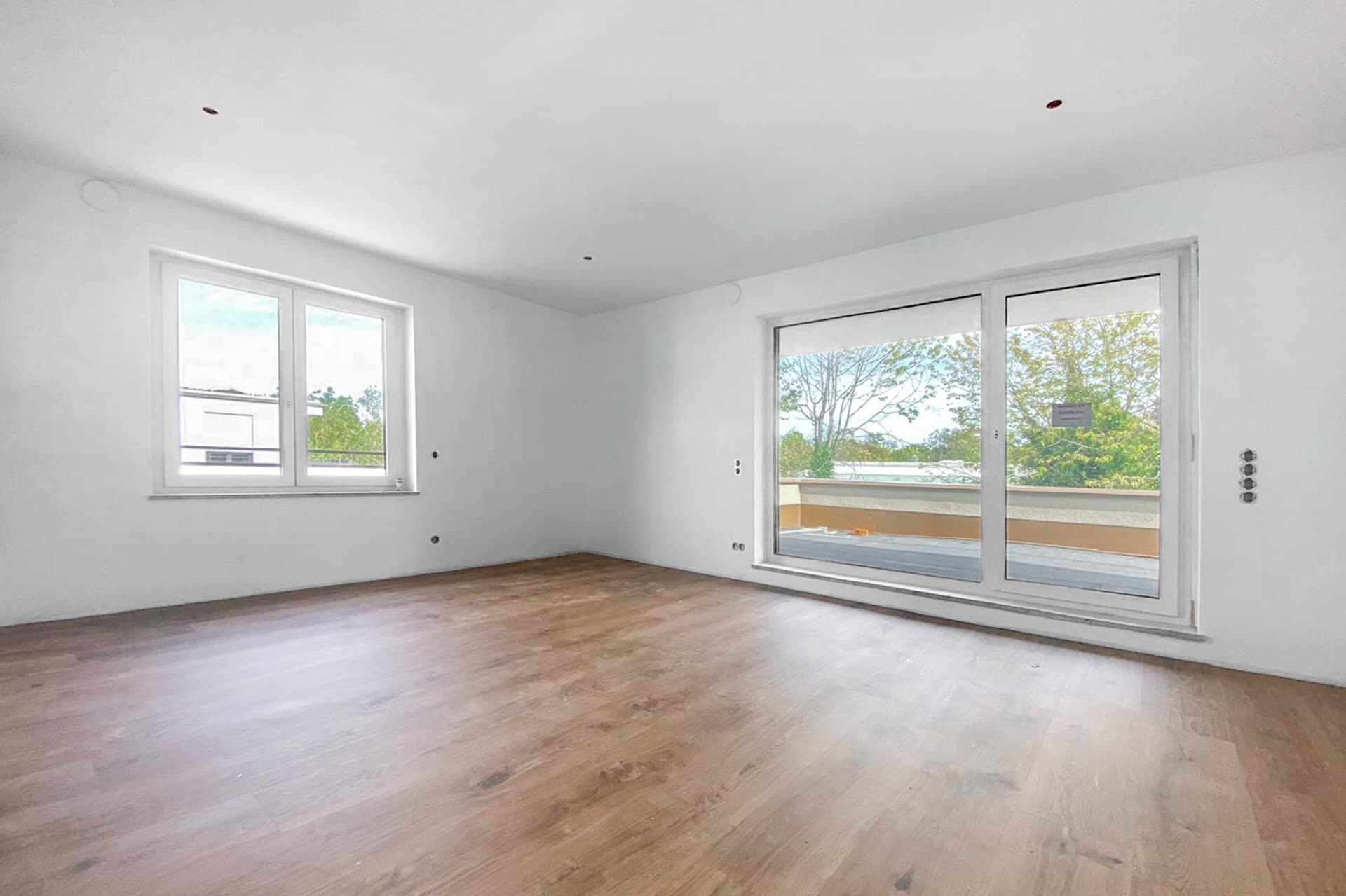 AIGNER - Neubau: Großzügige und lichtdurchflutete 2 - Zimmer Penthouse-Wohnung!
