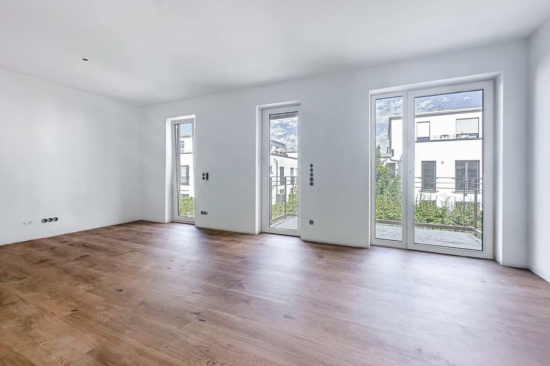 AIGNER - Neubau: Großzügige 1-Zimmer-Wohnung mit Balkon in Feldmoching!