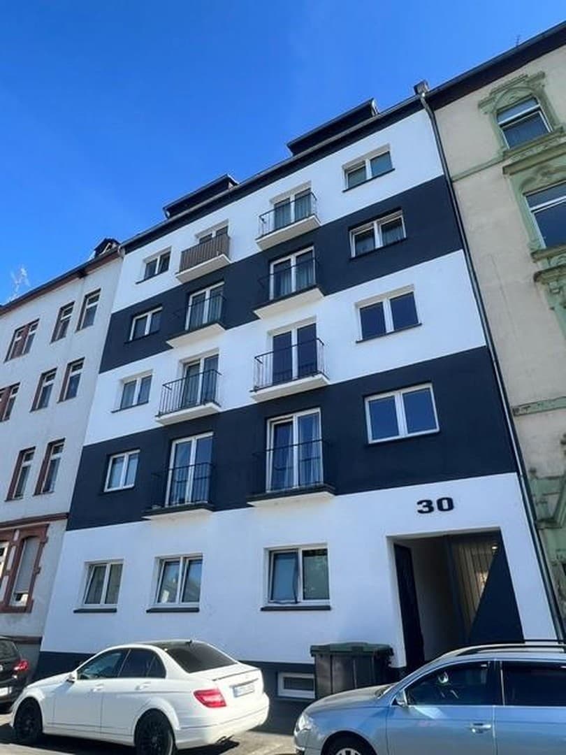 Energetisch kernsaniertes Mehrfamilienhaus-Ensemble mit 16 Wohneinheiten